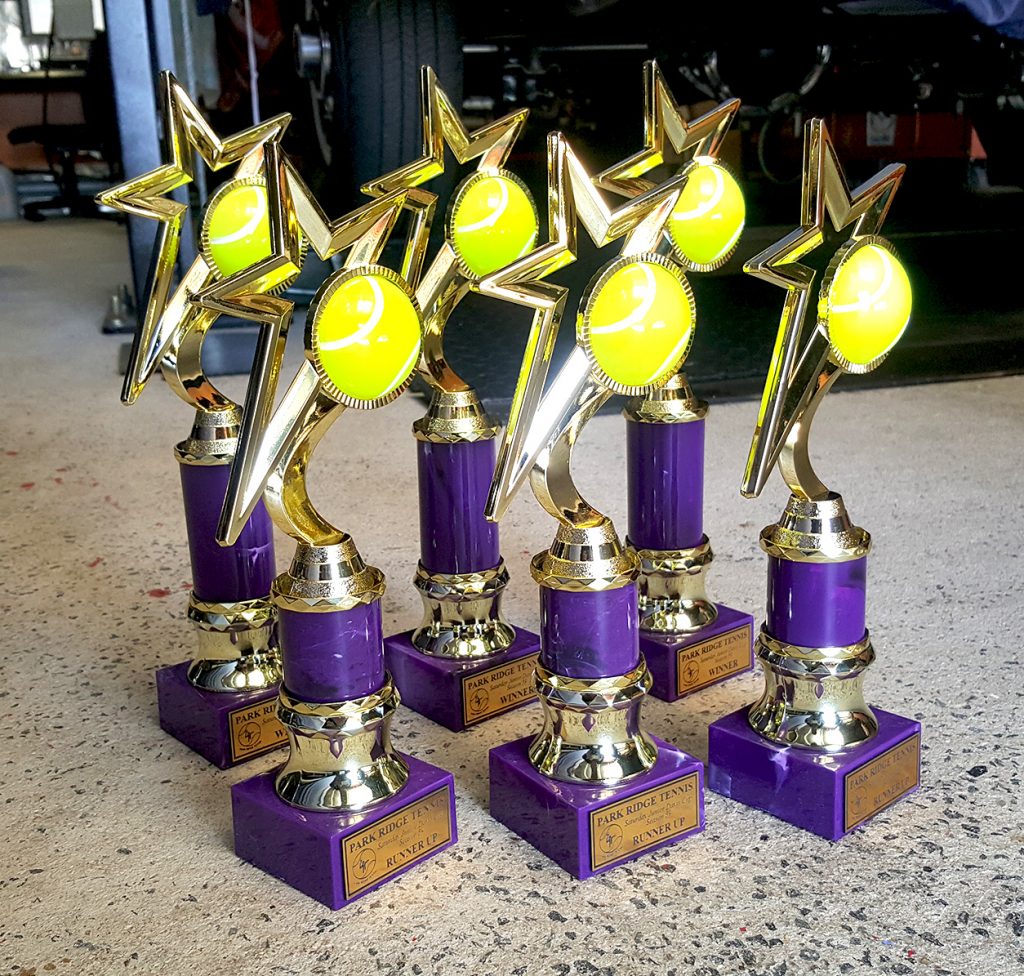Purple and Gold Tennis Trophies